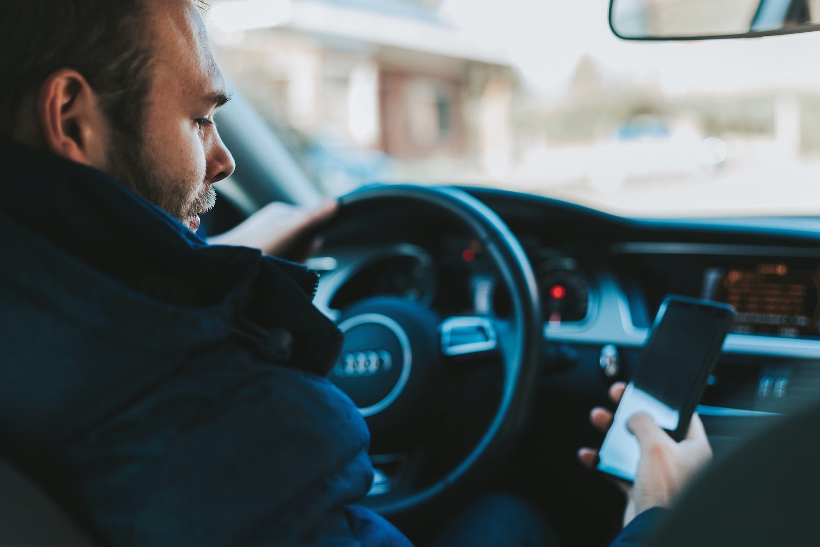 Person using the phone while driving